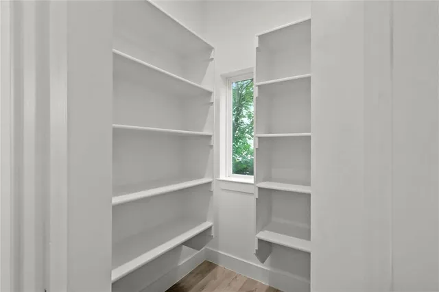 a view of an empty walk in closet