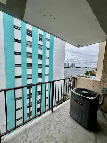 a view of a balcony with a sink