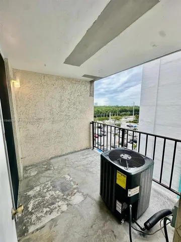 a view of a porch with furniture