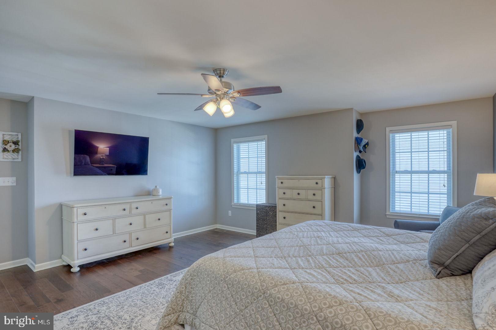 513 Spring Hollow Drive Middletown, DE 19709 - Photo 29 of 83 a bedroom with a bed and a flat screen tv