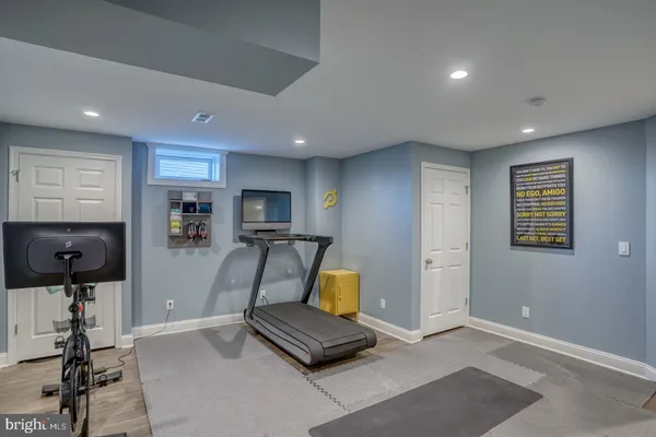 a view of a room with gym equipment