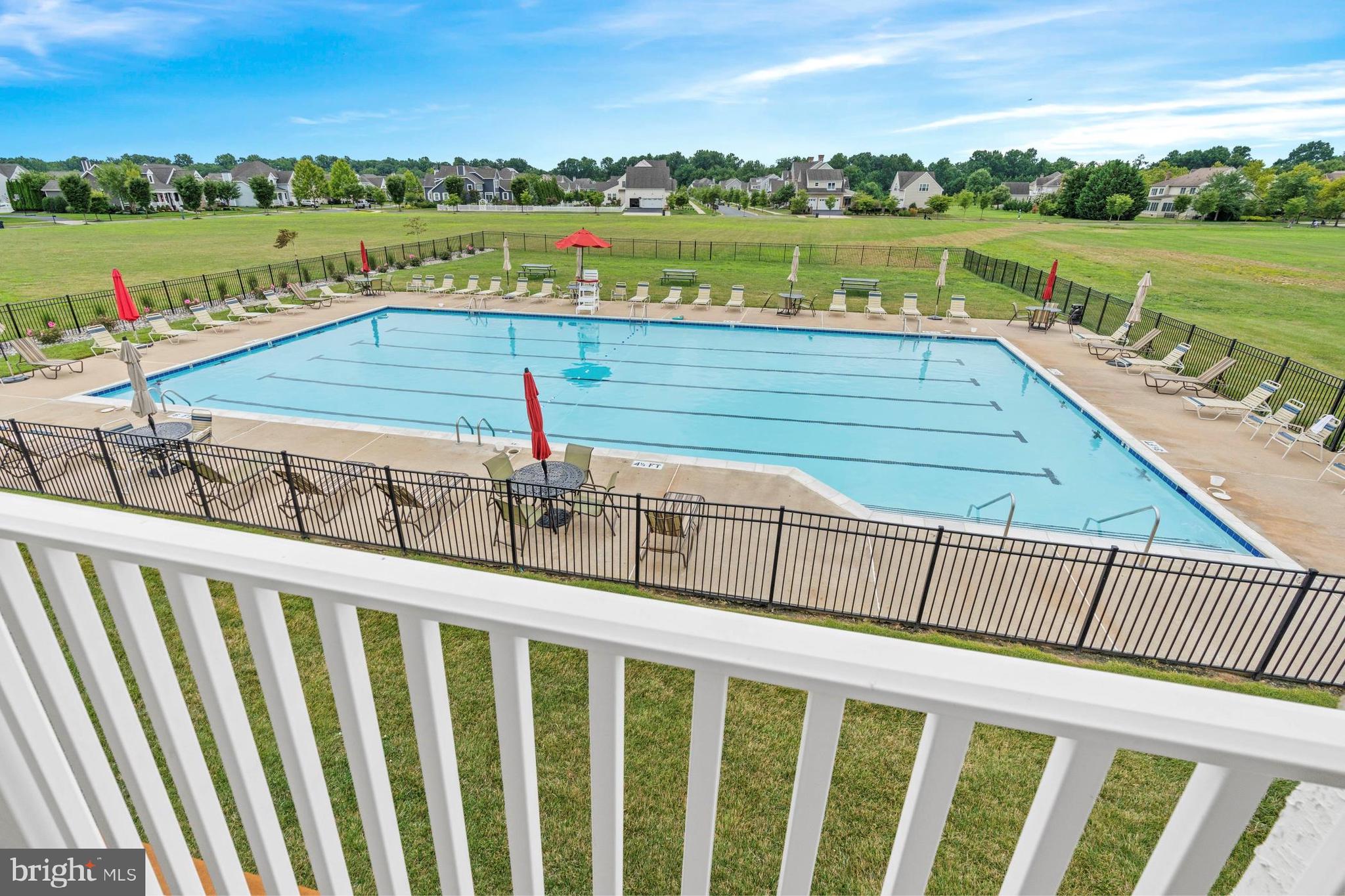 513 Spring Hollow Drive Middletown, DE 19709 - Photo 71 of 83 a view of a swimming pool with a terrace