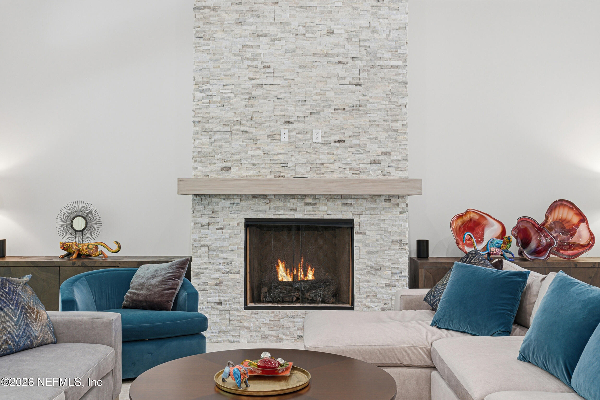 4640 Palm Vly Road Ponte Vedra Beach, FL 32082 - Photo 12 of 72 a living room with furniture and a fireplace