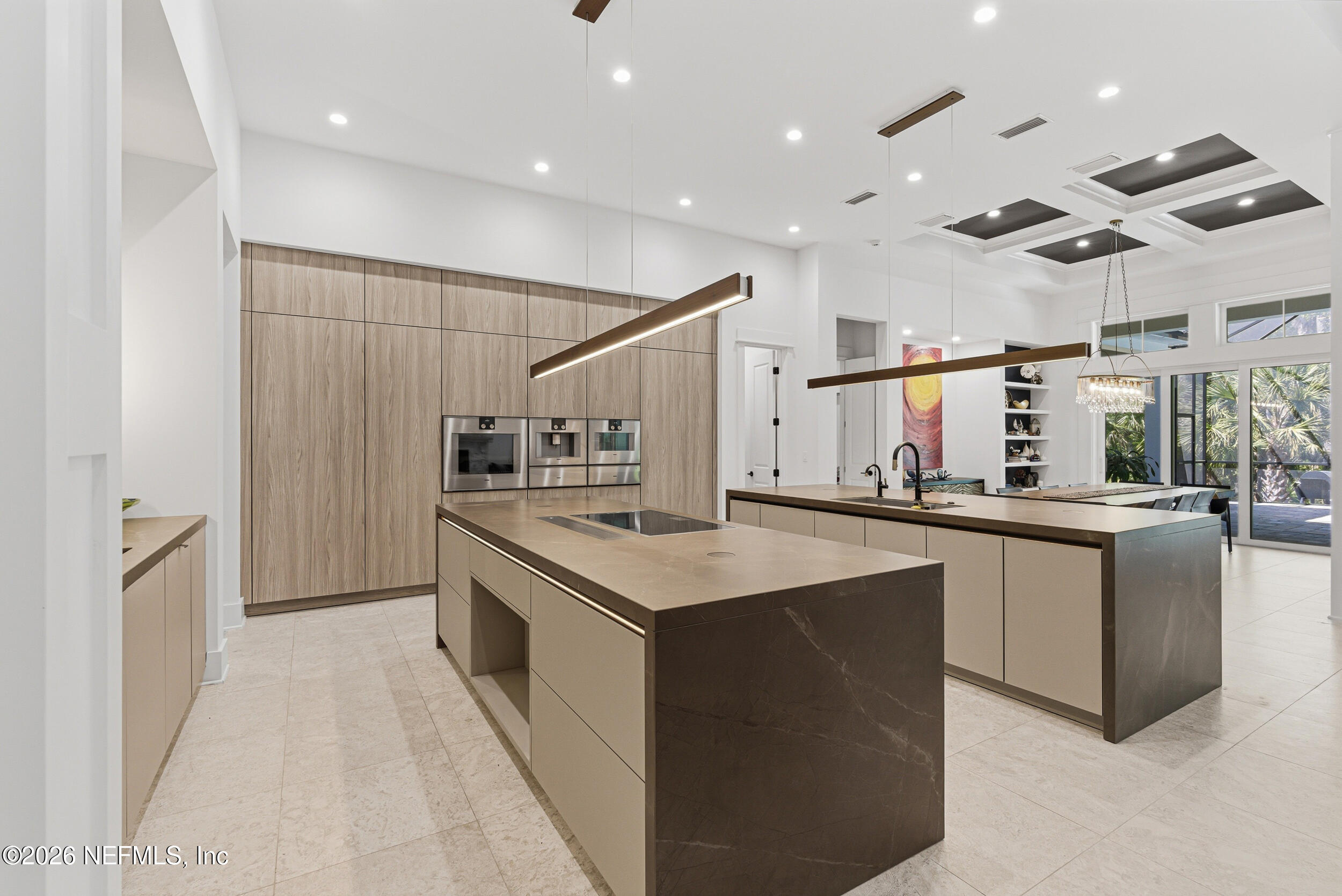 4640 Palm Vly Road Ponte Vedra Beach, FL 32082 - Photo 16 of 72 a kitchen with stainless steel appliances granite countertop a sink and cabinets