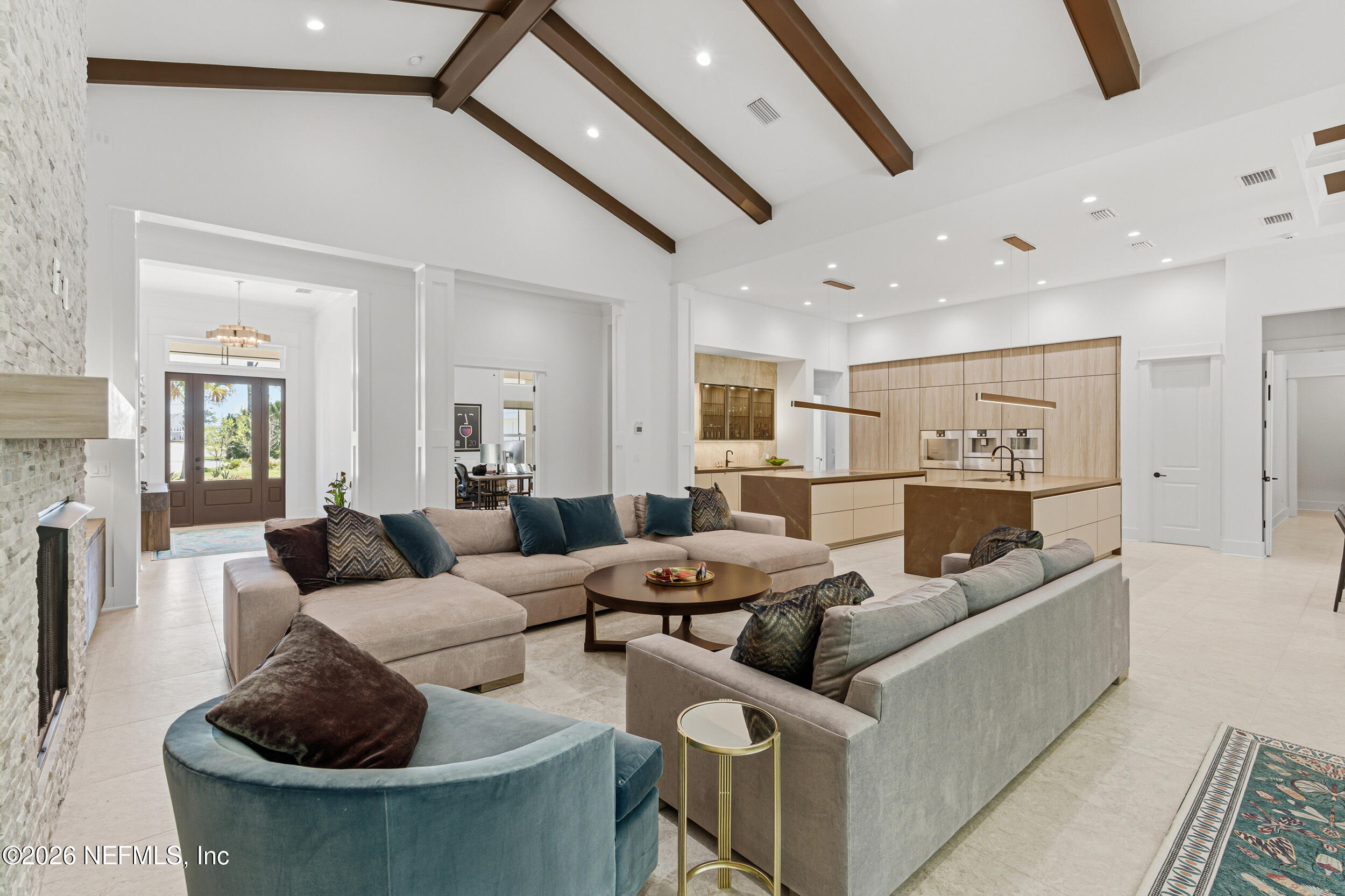 4640 Palm Vly Road Ponte Vedra Beach, FL 32082 - Photo 17 of 72 a living room with furniture and a ceiling fan