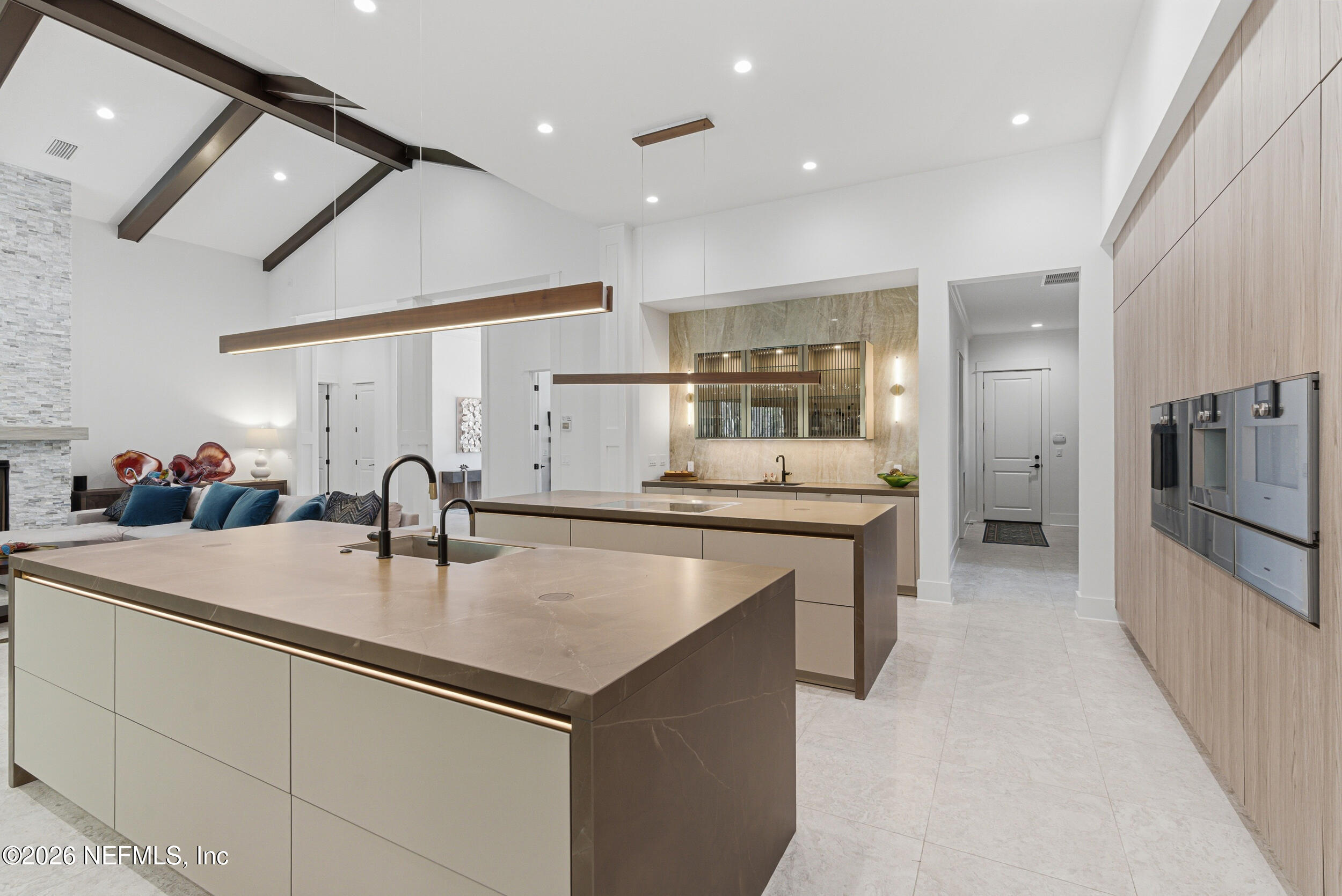 4640 Palm Vly Road Ponte Vedra Beach, FL 32082 - Photo 18 of 72 a kitchen with stainless steel appliances granite countertop a sink and a refrigerator