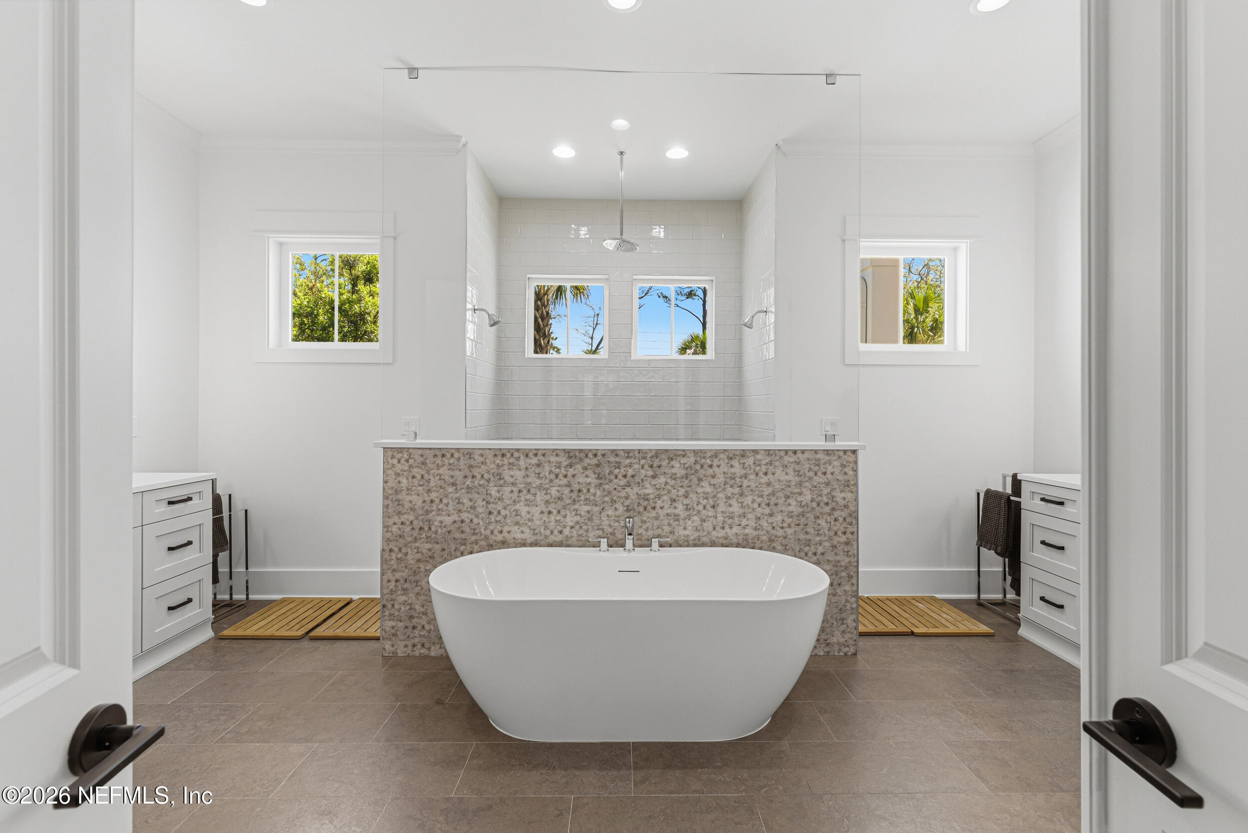 4640 Palm Vly Road Ponte Vedra Beach, FL 32082 - Photo 31 of 72 a spacious bathroom with a bathtub and a window