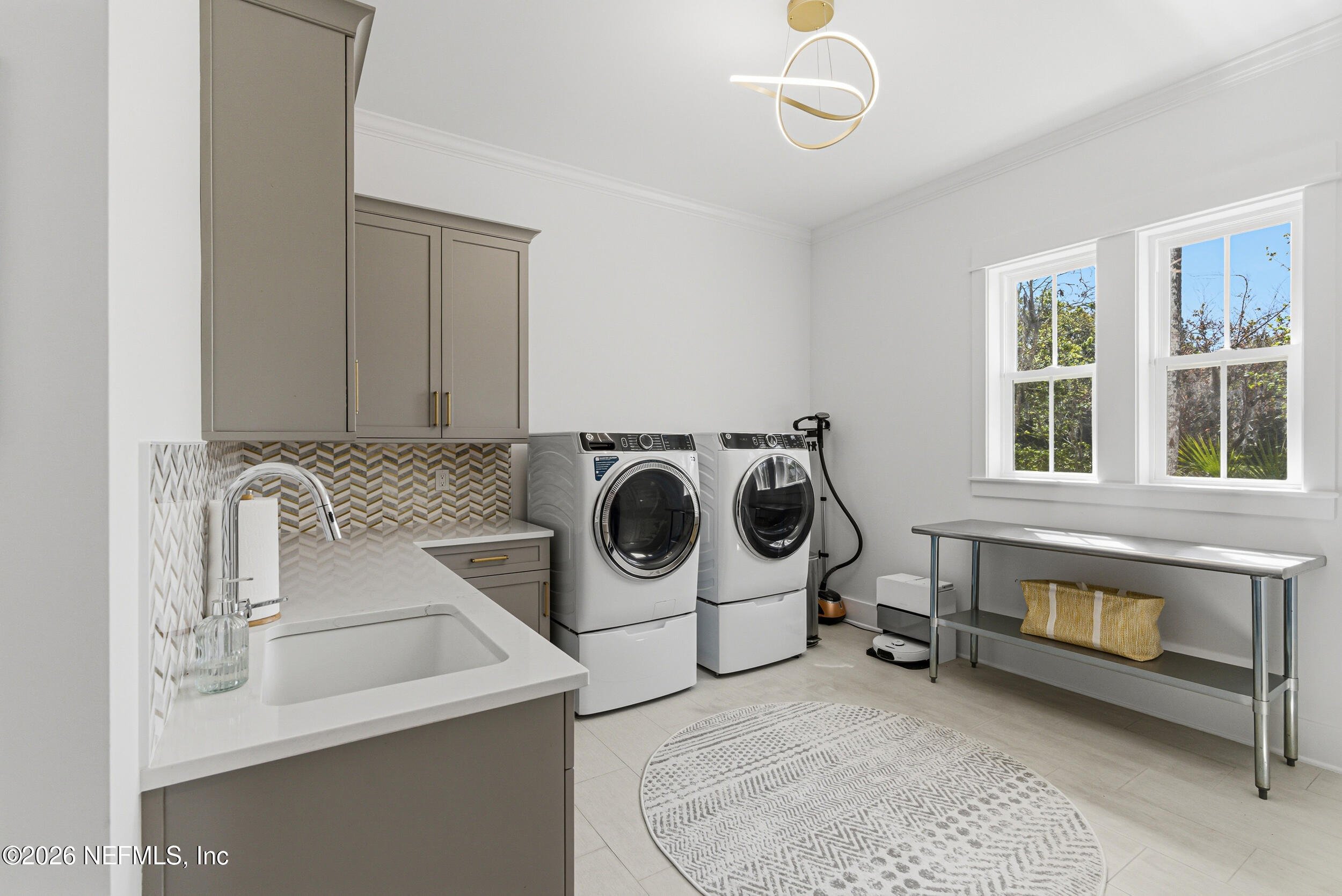 4640 Palm Vly Road Ponte Vedra Beach, FL 32082 - Photo 39 of 72 a utility room with dryer and washer