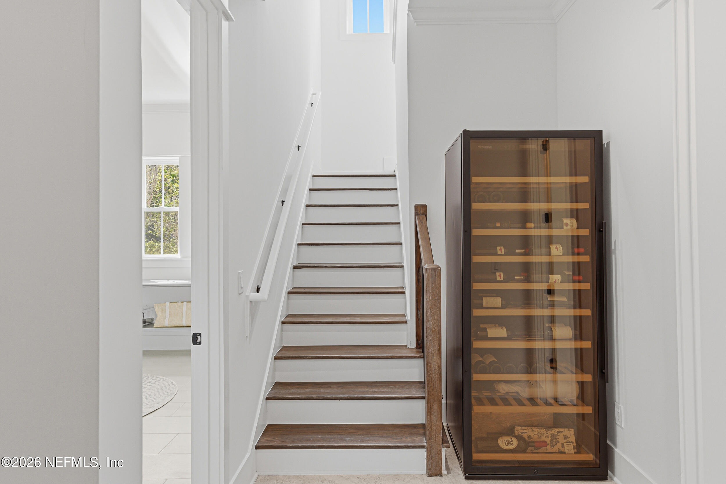 4640 Palm Vly Road Ponte Vedra Beach, FL 32082 - Photo 41 of 72 a view of a hallway with wooden floor and windows