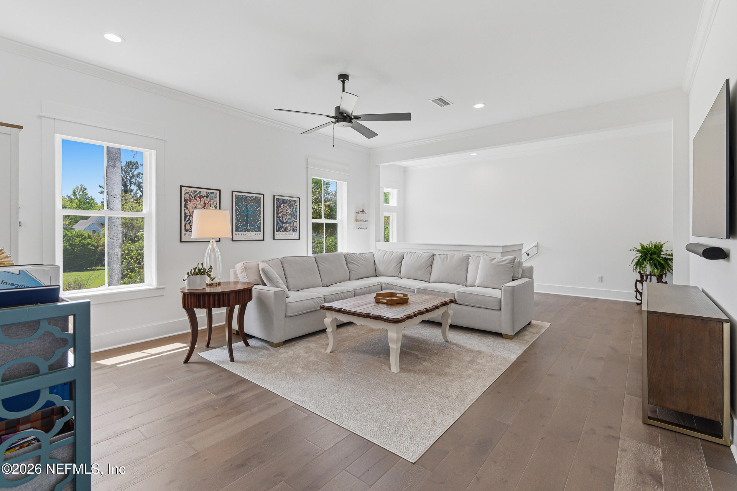 4640 Palm Vly Road Ponte Vedra Beach, FL 32082 - Photo 43 of 72 a living room with furniture a ceiling fan and a window