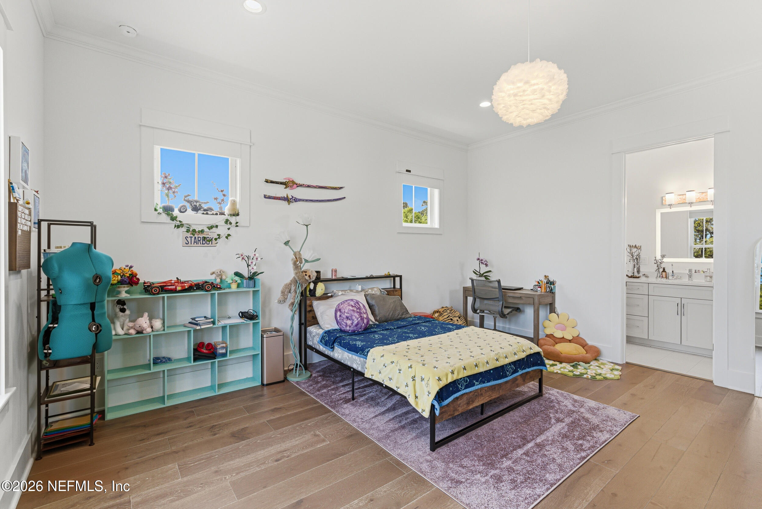 4640 Palm Vly Road Ponte Vedra Beach, FL 32082 - Photo 48 of 72 a bedroom with furniture and a wooden floor