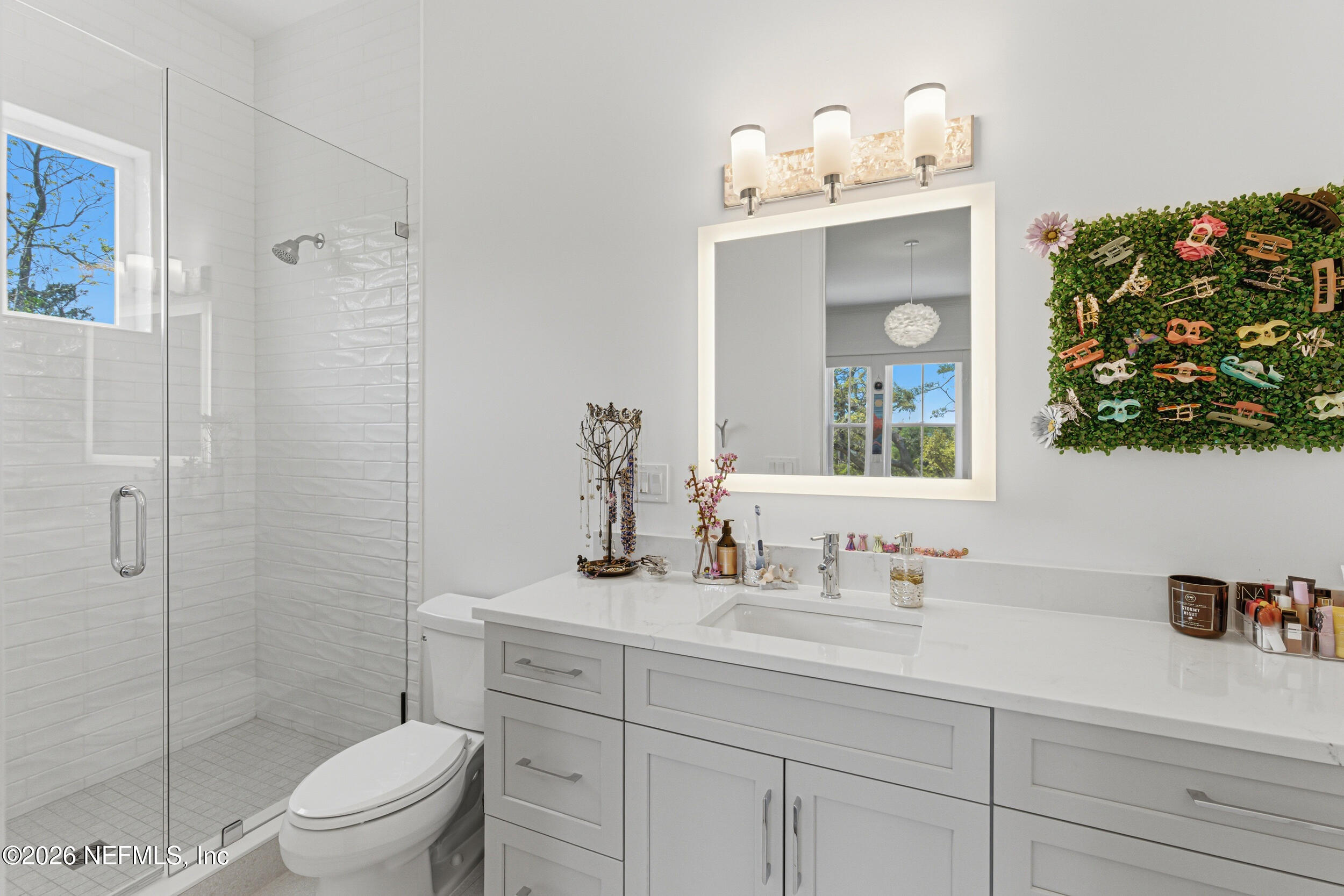 4640 Palm Vly Road Ponte Vedra Beach, FL 32082 - Photo 49 of 72 a bathroom with a sink a toilet and shower