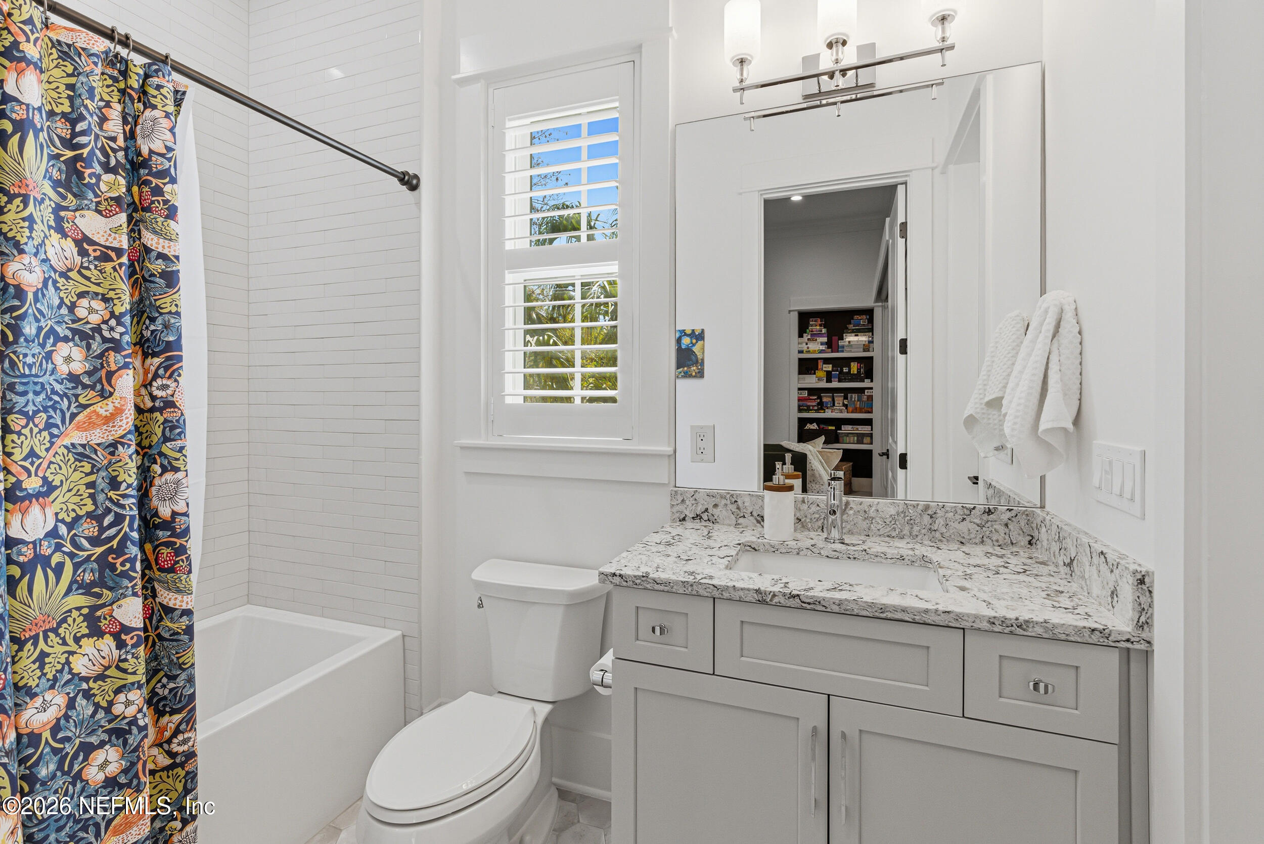 4640 Palm Vly Road Ponte Vedra Beach, FL 32082 - Photo 51 of 72 a bathroom with a granite countertop sink a toilet and shower