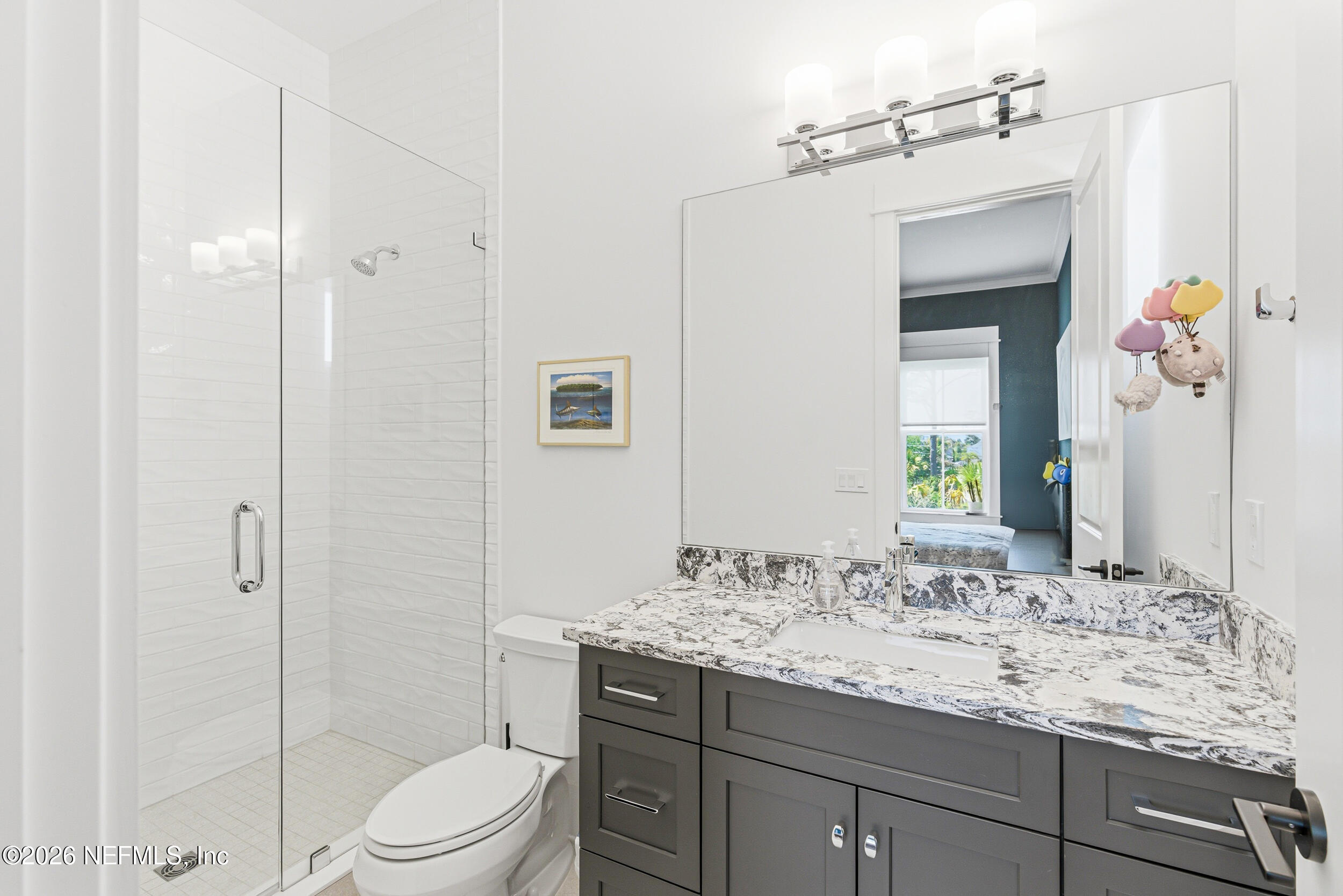4640 Palm Vly Road Ponte Vedra Beach, FL 32082 - Photo 53 of 72 a bathroom with a granite countertop sink toilet and shower