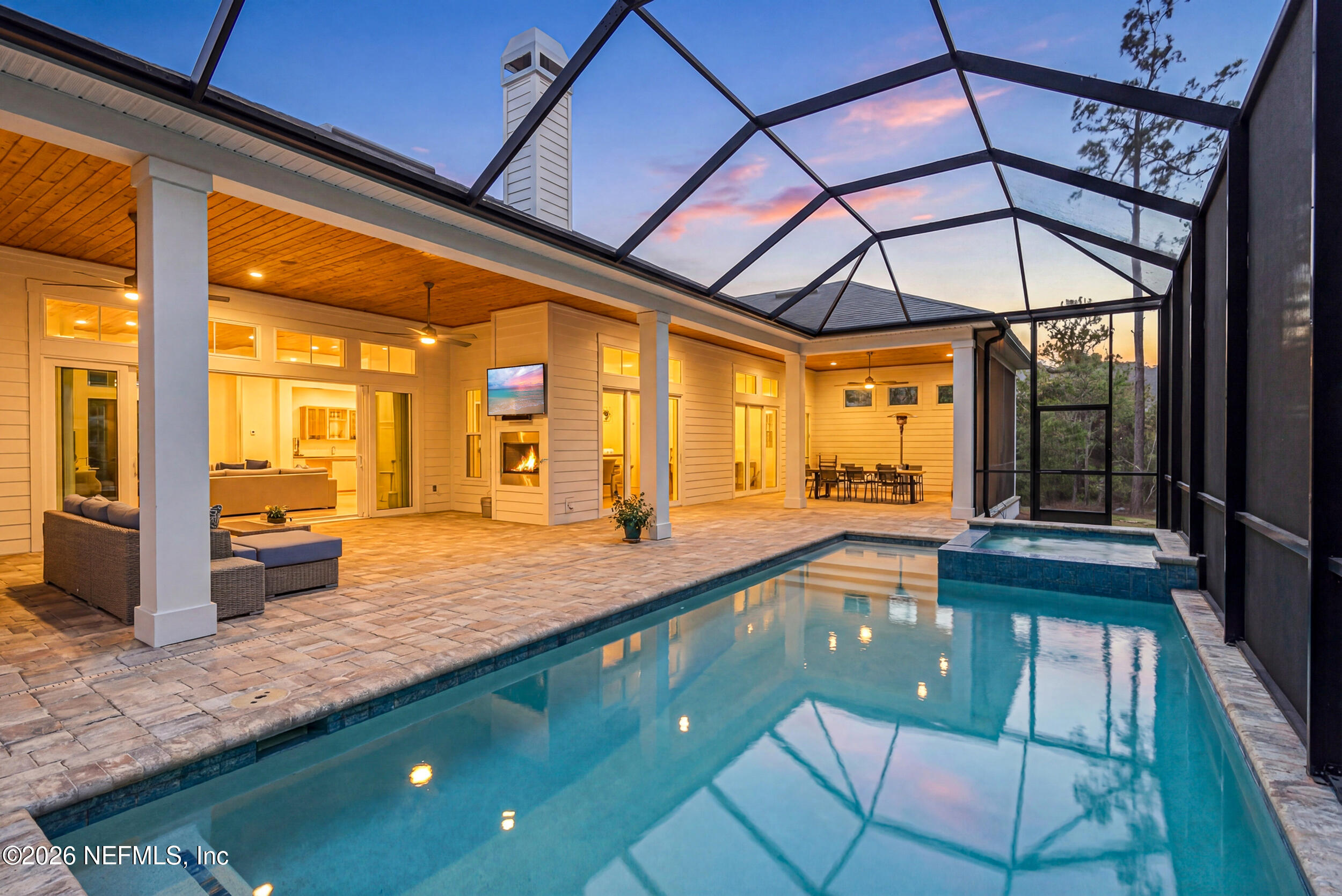 4640 Palm Vly Road Ponte Vedra Beach, FL 32082 - Photo 57 of 72 a swimming pool with a outdoor seating