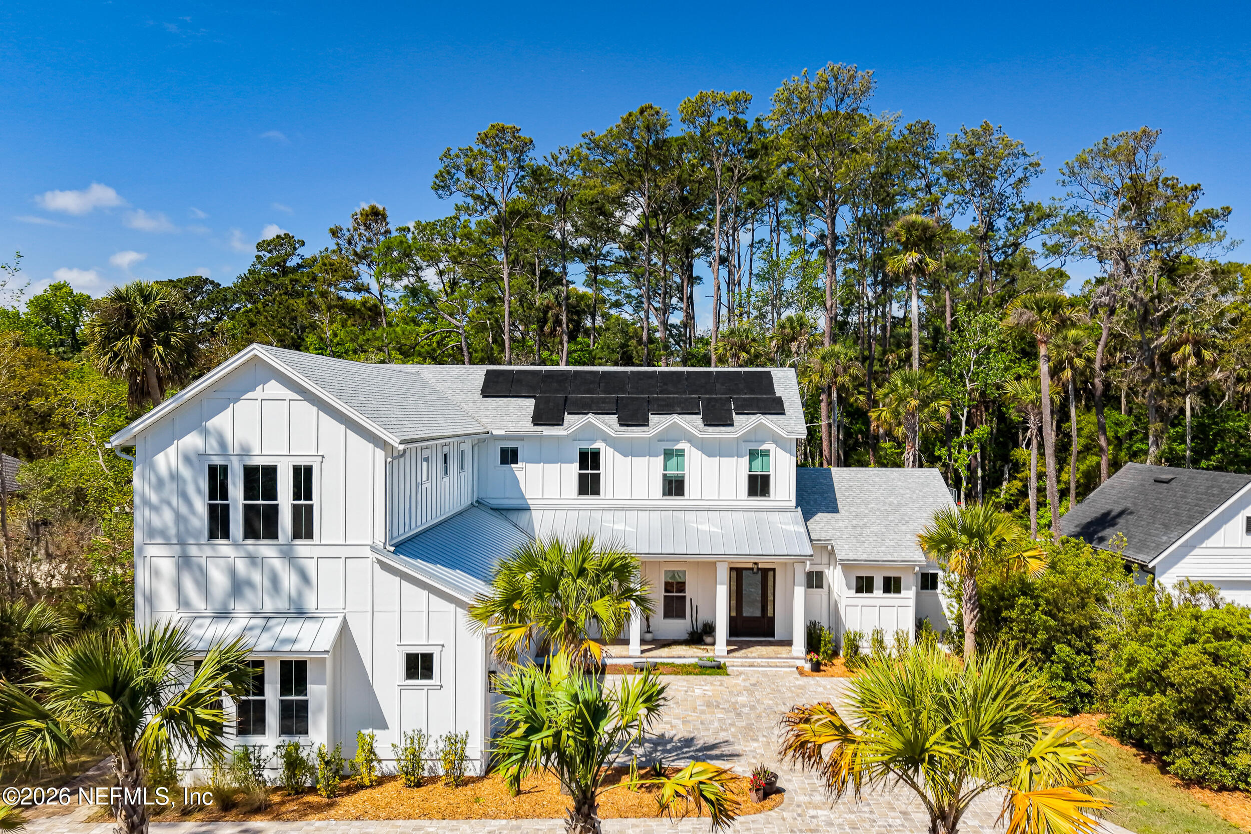 4640 Palm Vly Road Ponte Vedra Beach, FL 32082 - Photo 67 of 72 a front view of a house with a garden