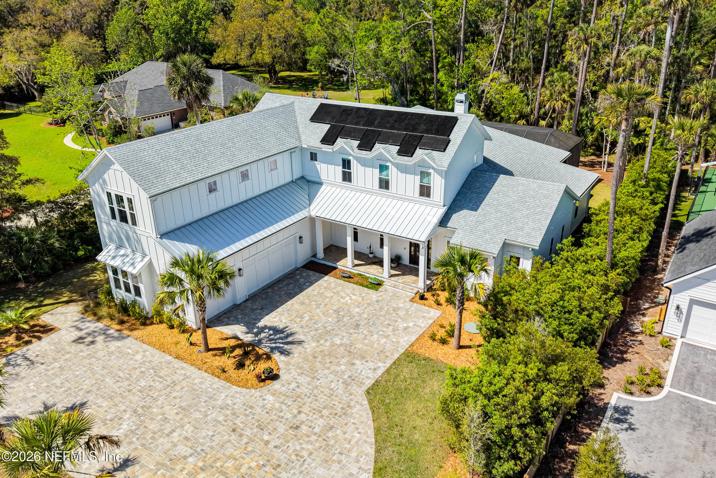 4640 Palm Vly Road Ponte Vedra Beach, FL 32082 - Photo 69 of 72 an aerial view of a house with a yard sitting space