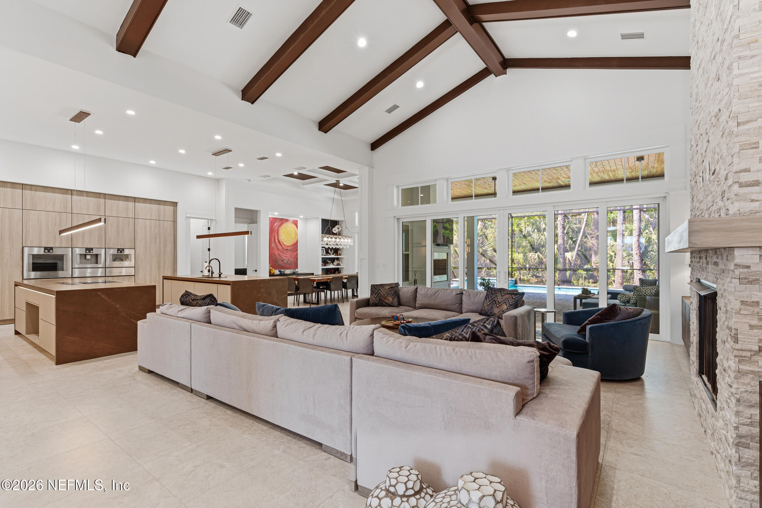 4640 Palm Vly Road Ponte Vedra Beach, FL 32082 - Photo 9 of 72 a living room with furniture and a flat screen tv