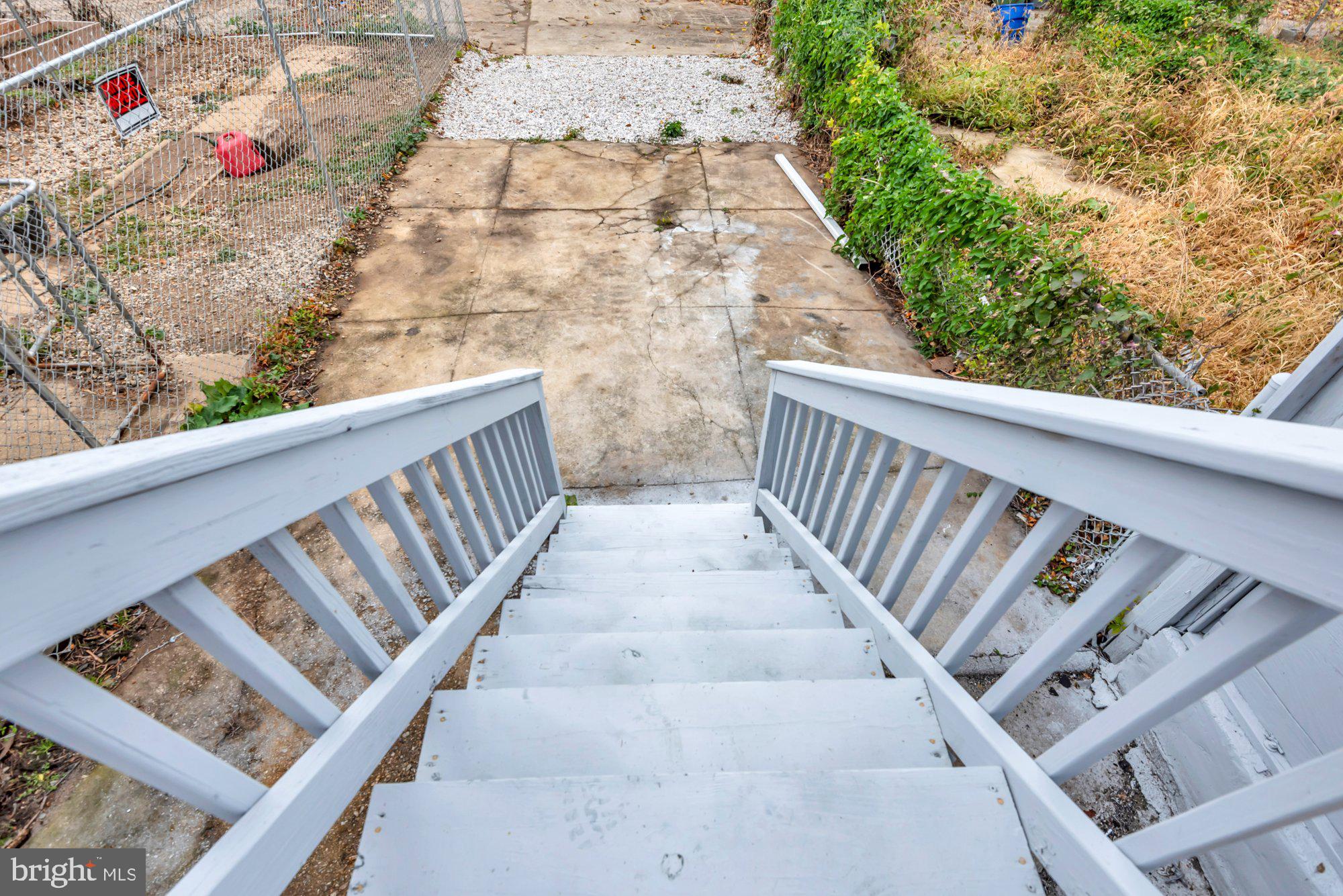 1904 Kennedy Avenue Baltimore, MD 21218 - Photo 27 of 29 a view of entryway with wooden stairs