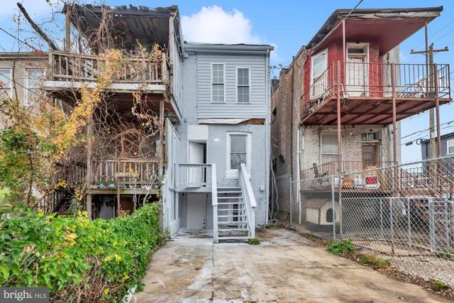 a front view of a house with a porch