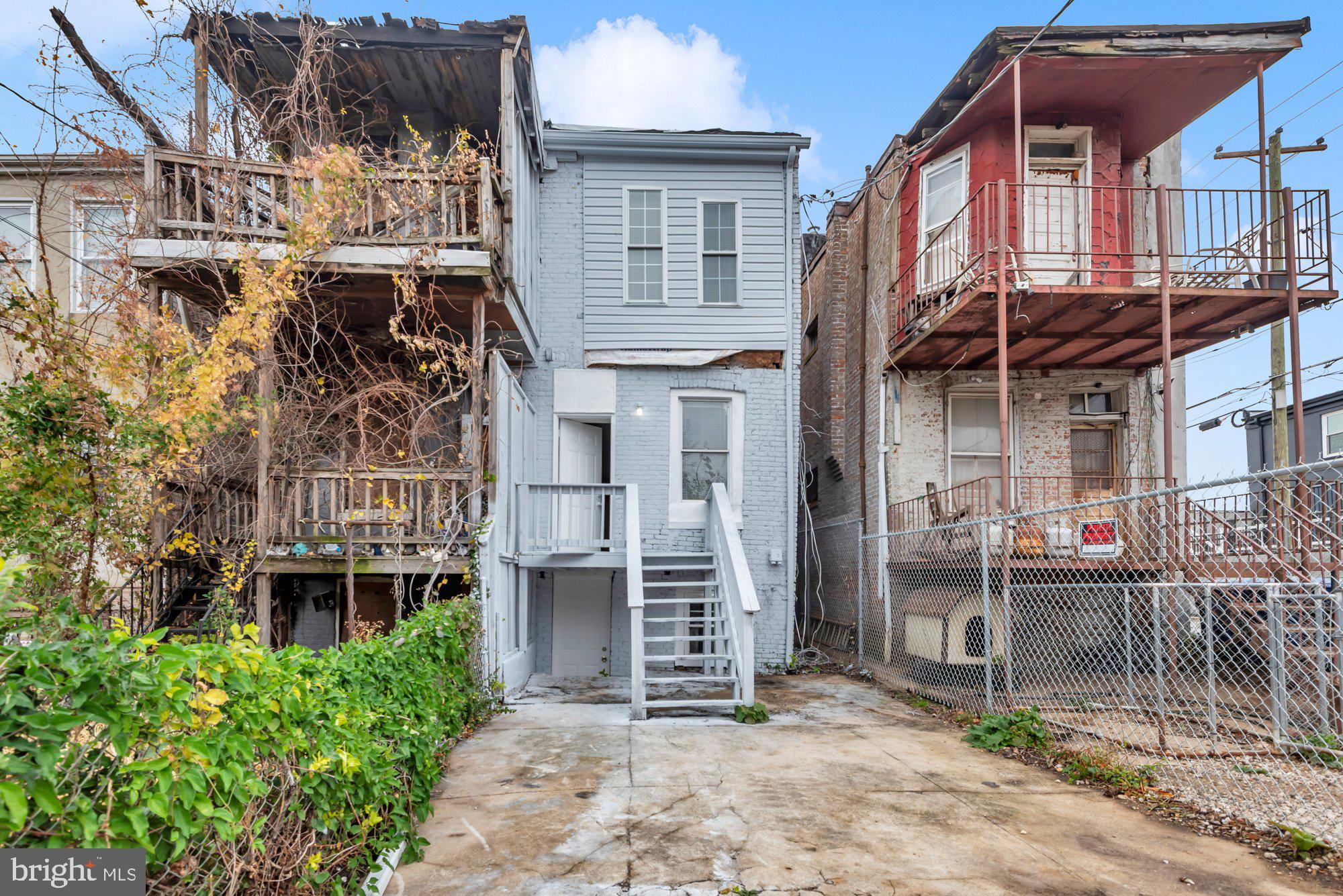 1904 Kennedy Avenue Baltimore, MD 21218 - Photo 29 of 29 a front view of a house with a porch