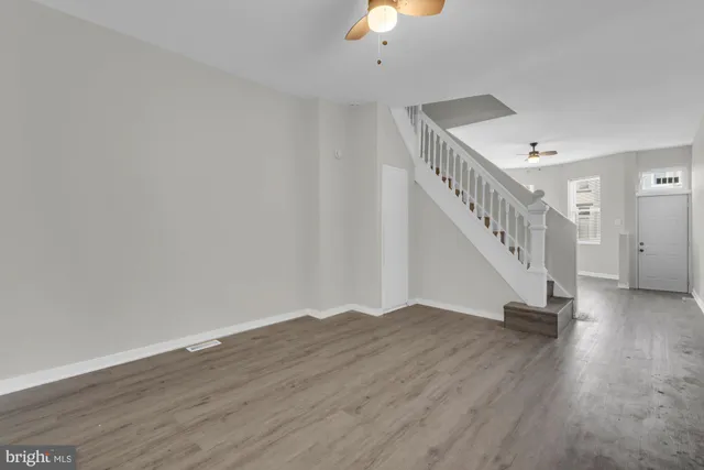 a view of entryway with wooden floor