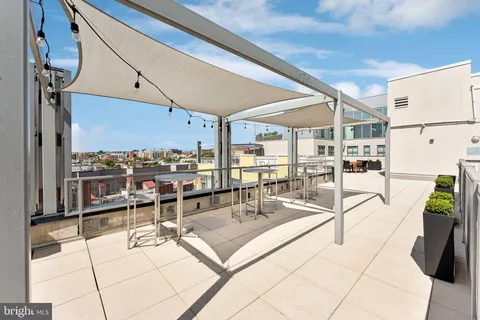 a lobby with furniture and a view of living room