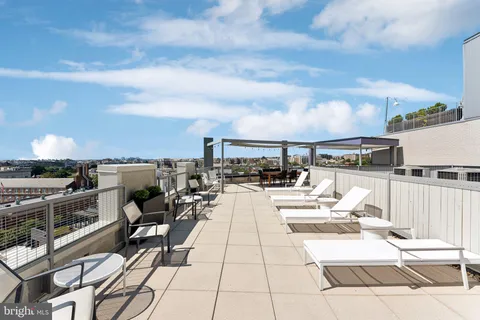 a view of roof deck with seating space