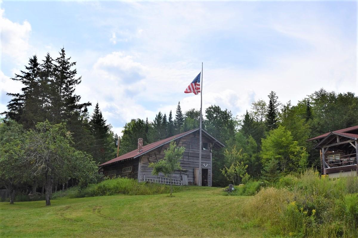 257 Garfield Road Garfield, ME 04732 - Photo 9 of 40 View of garage & home...
