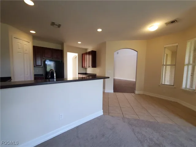 a view of a kitchen with a sink