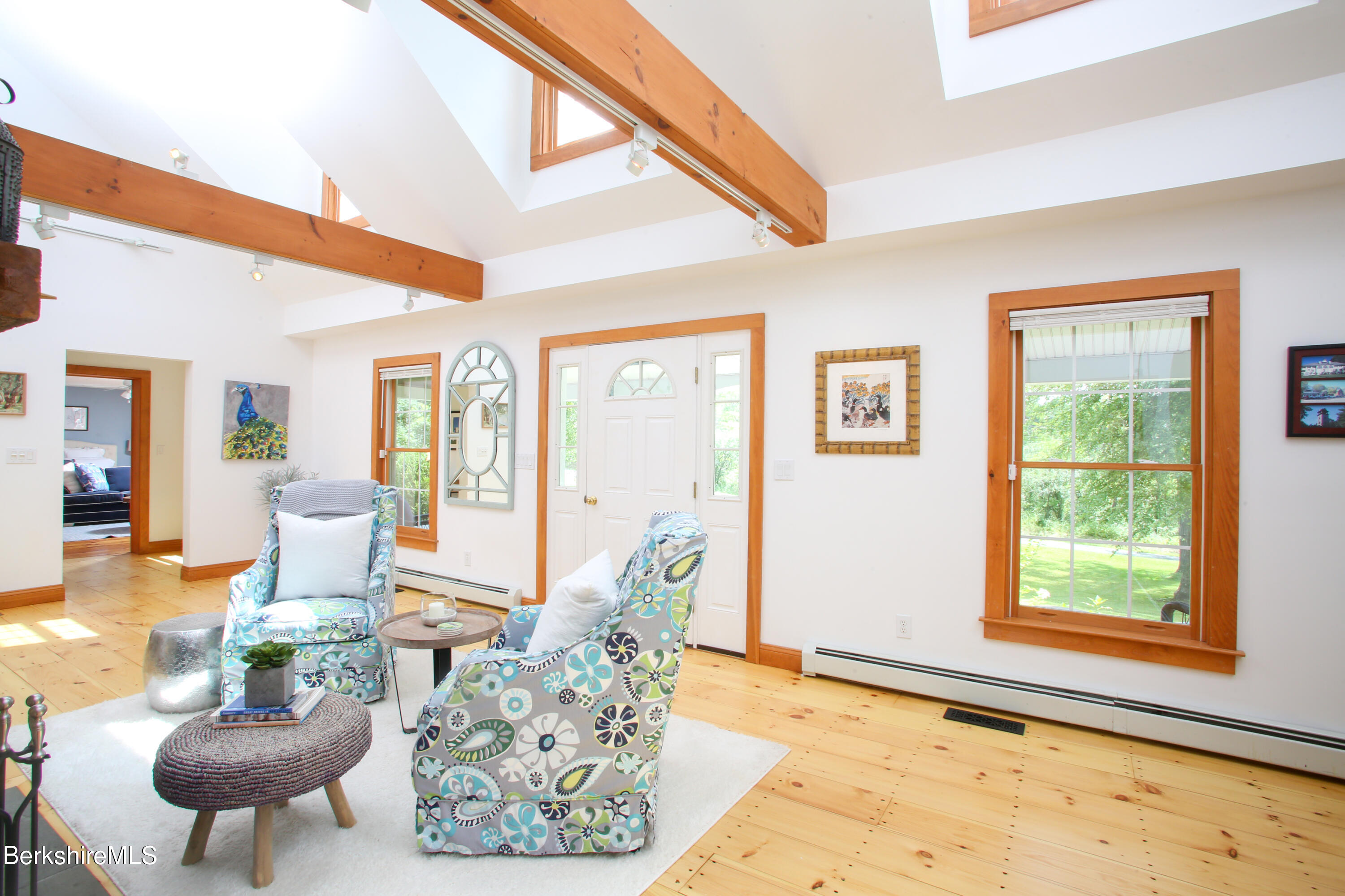11 A Interlaken Cross Road Stockbridge, MA 01262 - Photo 5 of 40 a living room with furniture and a large window