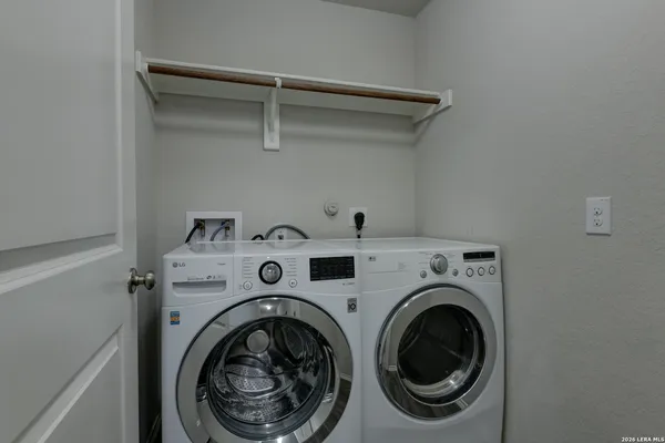 a utility room with dryer and washer