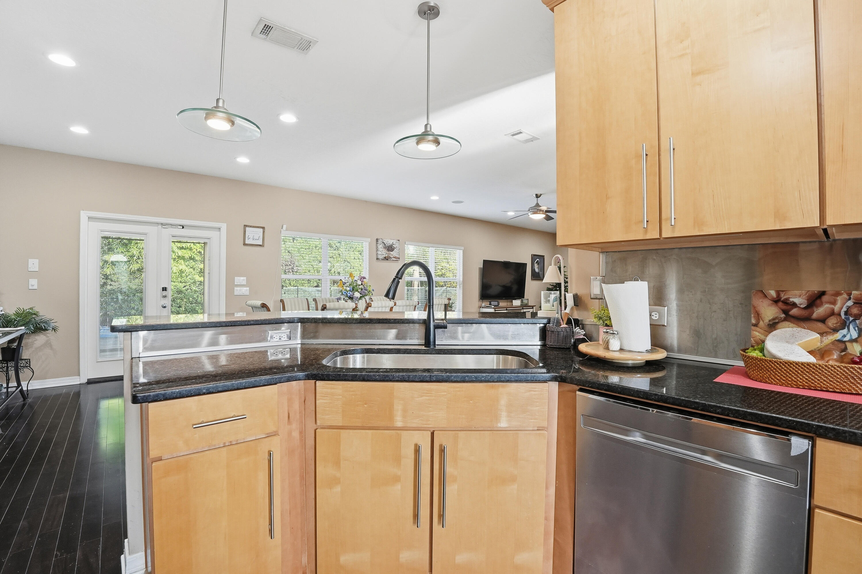 1961 Chesapeake Ridge Fort Walton Beach, FL 32547 - Photo 18 of 47 a kitchen with stainless steel appliances granite countertop a sink a stove and a refrigerator