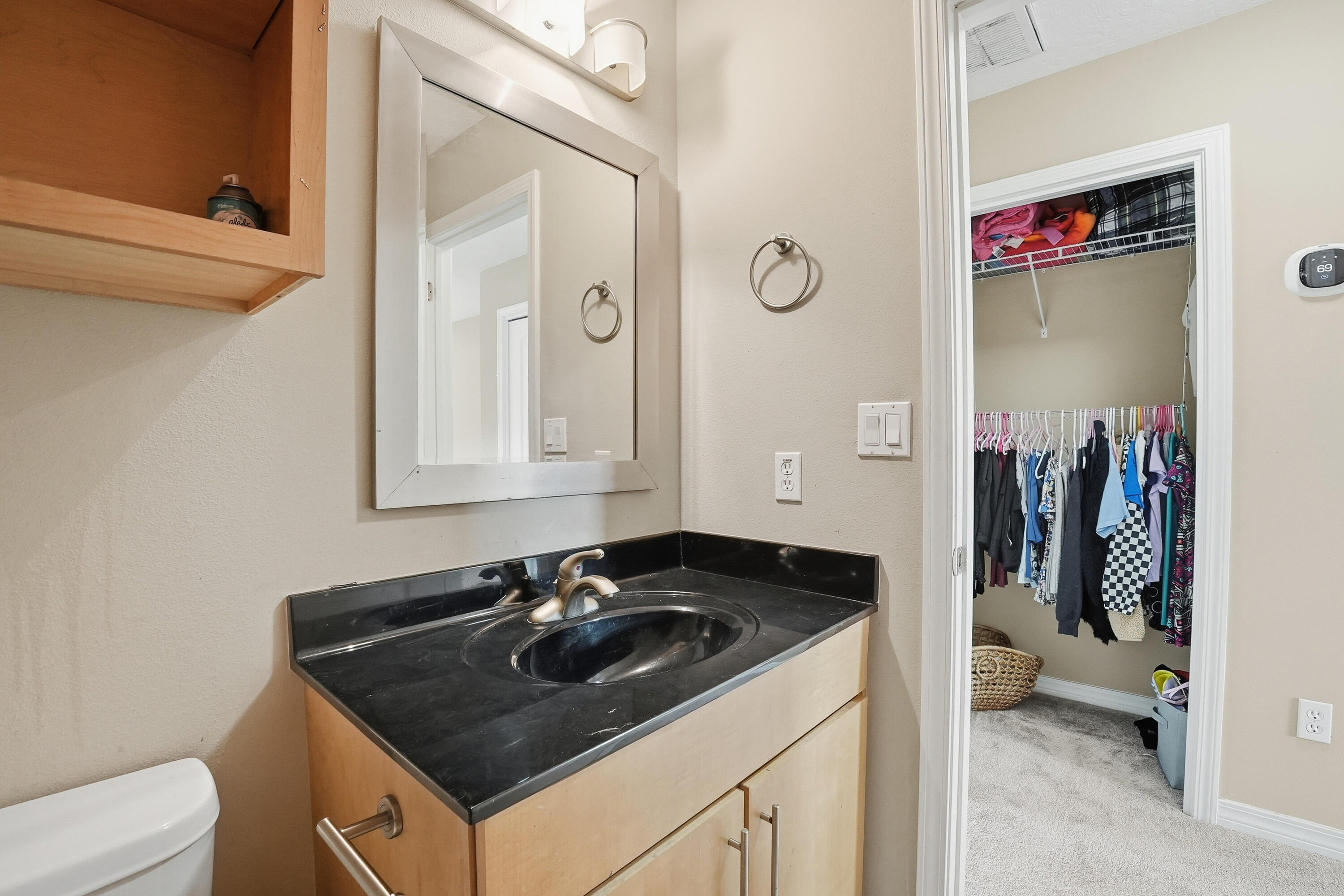 1961 Chesapeake Ridge Fort Walton Beach, FL 32547 - Photo 36 of 47 a bathroom with a sink and a mirror