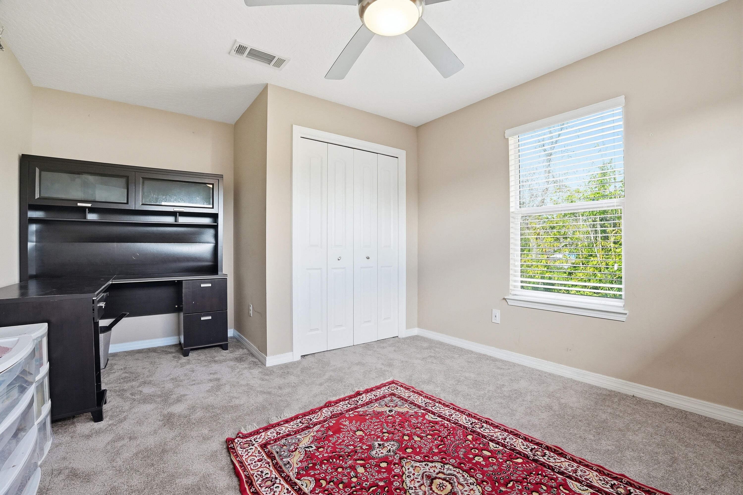 1961 Chesapeake Ridge Fort Walton Beach, FL 32547 - Photo 37 of 47 a living room with a bed furniture and a window