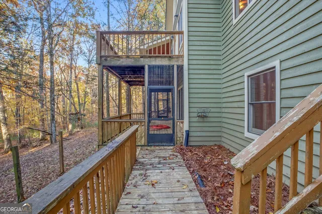 a view of balcony with wooden floor