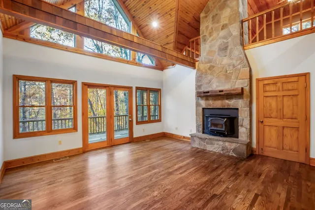 a view of an entryway with wooden floor