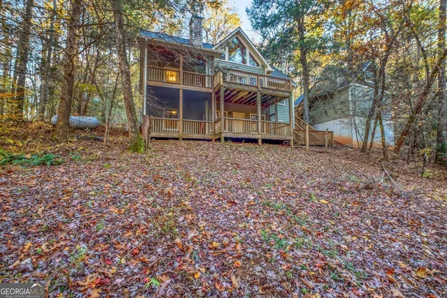 a view of balcony with wooden floor
