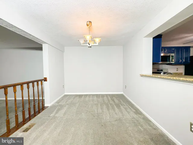 a view of a kitchen with a sink cabinets and a window