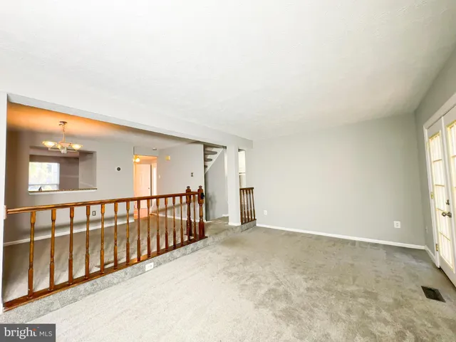 en empty room with windows