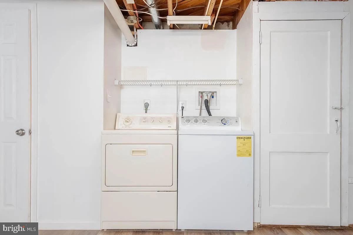 204 Kingston Road Middle River, MD 21220 - Photo 12 of 16 a utility room with dryer and washer
