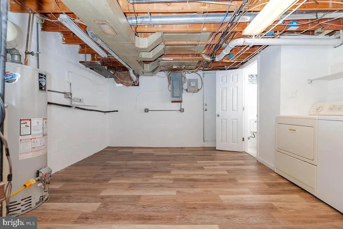 204 Kingston Road Middle River, MD 21220 - Photo 14 of 16 a view of a room with racks on the wall