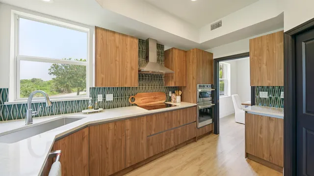 a view of a floor to ceiling window and a swimming pool