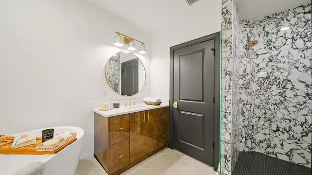 a bathroom with a sink toilet and shower