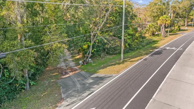 a view of a yard with sitting area