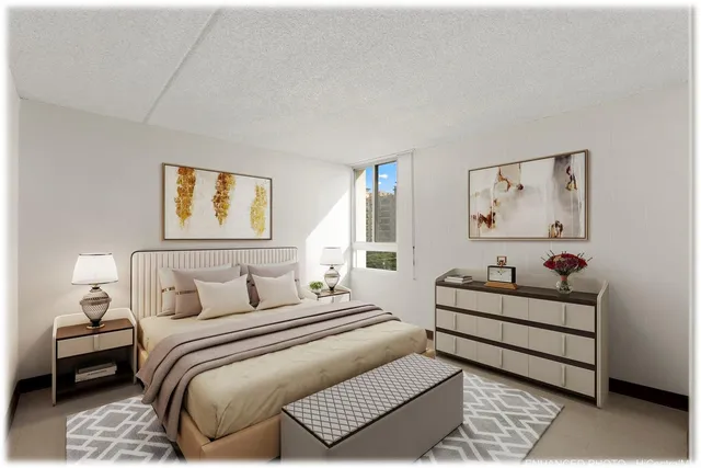 a picture of a bench in front of a wall