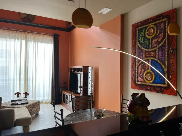 a front view of a room with gym equipment