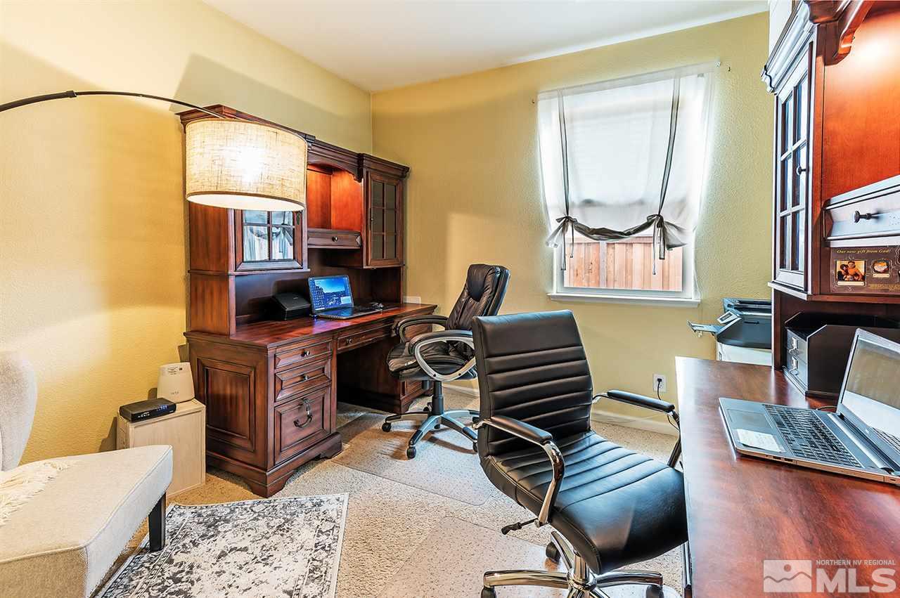 395 Sondrio Way Reno, NV 89521 - Photo 18 of 25 a living room with furniture and a flat screen tv