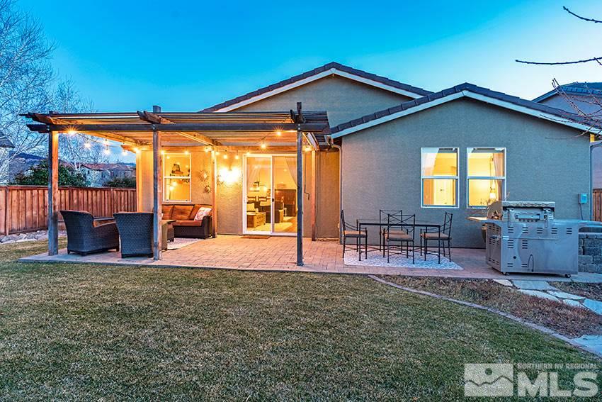 395 Sondrio Way Reno, NV 89521 - Photo 22 of 25 a view of a house with backyard porch and sitting area