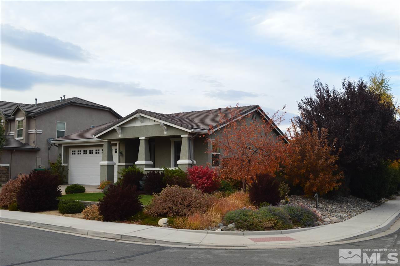 395 Sondrio Way Reno, NV 89521 - Photo 3 of 25 a front view of a house with garden